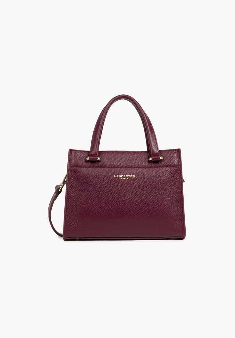 Burgundy leather handbag with textured surface, structured shape, dual handles, detachable strap, and gold-toned logo detailing on front.