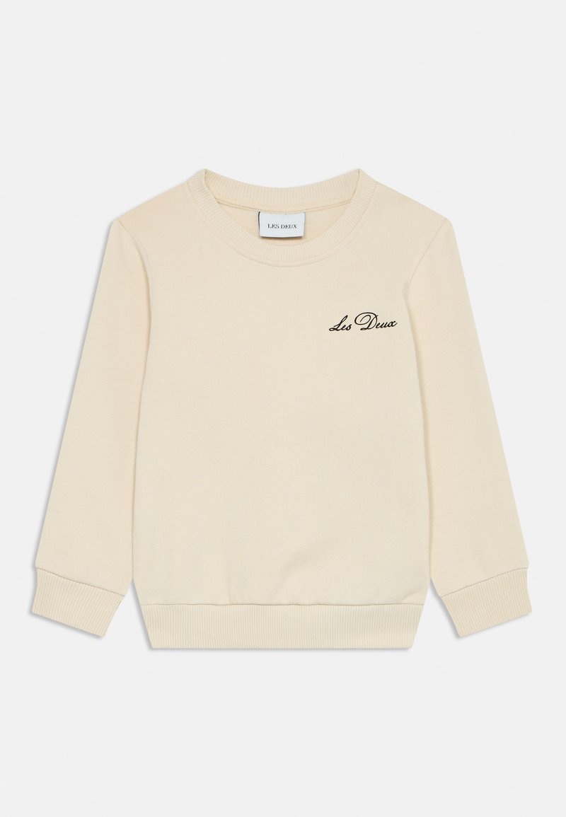 Bež pot sweatshirt z rebrastim okroglim izrezom, dolgimi rokavi in rebrastimi manšetami, ki ima črn vezen logotip na prsih.