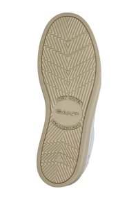 Suela de zapato de goma con un patrón de tracción en zigzag, color beige claro y detalles de marca en relieve "GANT" y "NEW HAVEN, CONNECTICUT."