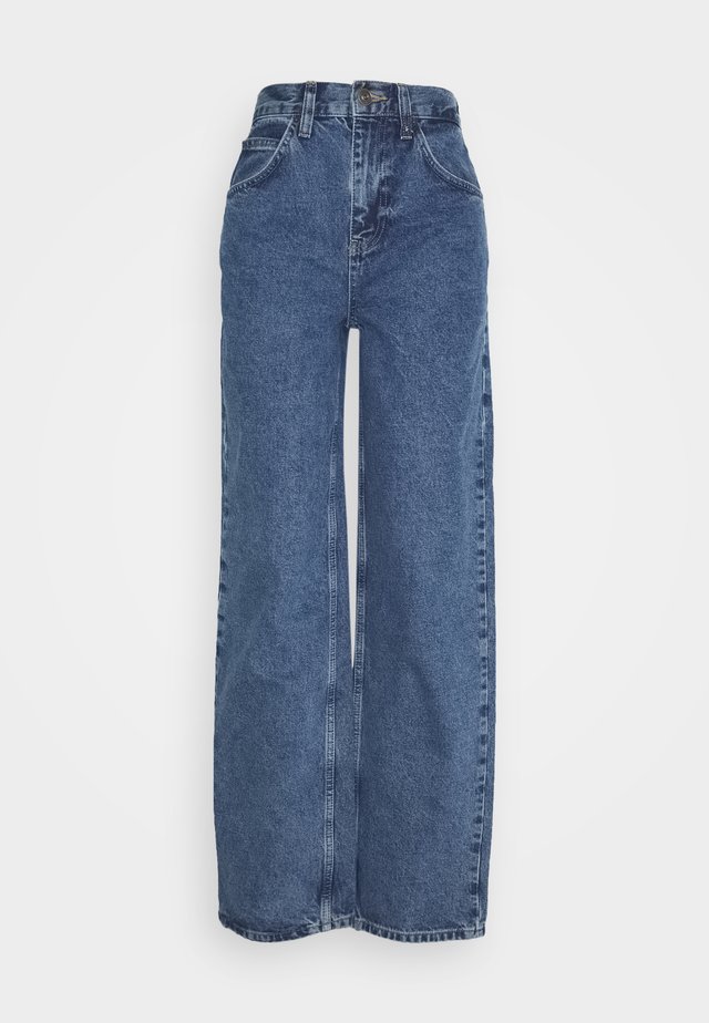 Wygoda i kobiecość: jeansy damskie Relaxed Fit z Zalando.