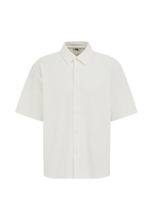 Lühikeste varrukatega valge nööpidega särk, millel on klassikaline krae ja lõdvestunud lõige, valgel taustal.