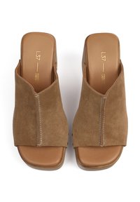 Brown suede open-toe heeled mules with a cut-out design, featuring a smooth leather insole and contrasting stitching detail.