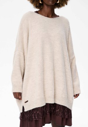 - Sweter