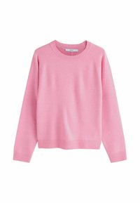 Różowy sweter z okrągłym dekoltem wykonany z miękkiego materiału dzianinowego. Posiada prążkowane mankiety i dół, ma luźny krój oraz rękawy raglanowe.