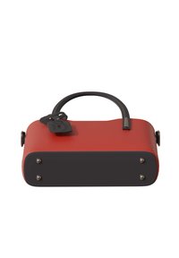 Red and black handbag with a structured shape, smooth leather material, top handle, and metal studs at the base. Includes a decorative tag.