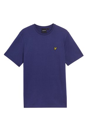 Mörkblå bomulls t-shirt med korta ärmar och rund hals. Har ett litet gult fågelmärke på vänster bröst. Slät textur.