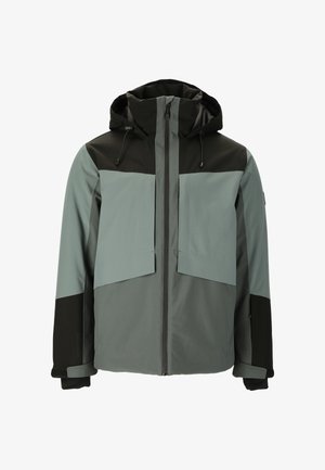 Chaqueta cortavientos en un diseño de dos tonos con parte superior verde oscura y parte inferior gris claro. Cuenta con cierre de cremallera frontal, grandes bolsillos en el pecho y capucha.