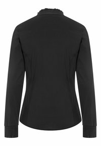 Black long-sleeve shirt with a ruffled collar, fitted cuffs, smooth texture, and a curved hemline; no visible patterns or hardware.