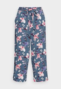 Blommig byxor med blå bakgrund prydd med rosa och lila blommor, fjärilar, elastisk midja och en avslappnad passform.