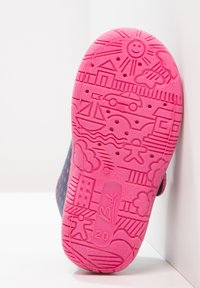 Pink rubber outsole with textured patterns including a sun, car, sailboat, and clouds. Features branding "Beck" and size "20."