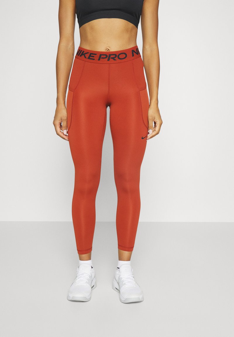 orange leggings nike
