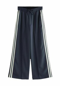 Pantalons courts navy avec une taille élastique et un cordon, présentant deux bandes latérales en bleu clair et blanc sur chaque jambe.