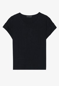 Svart kortärmad t-shirt med rund halsringning, tillverkad av ett mjukt och lätt tyg. Har en avslappnad passform och subtila sömnadsdetaljer.