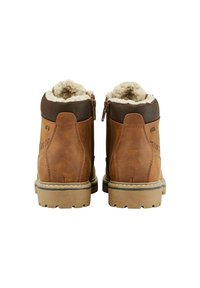 Bruine leren winterlaarzen met beige bontvoering, gestructureerde rubberen zolen en zijknopens, gezien van achteren.