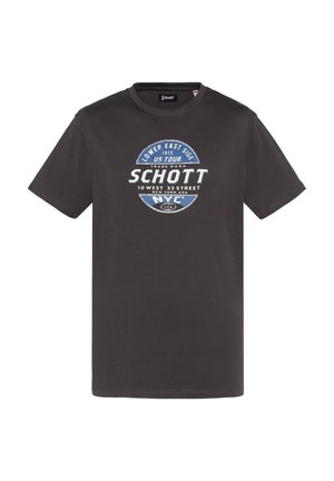 Camiseta de algodón gris oscuro con cuello redondo. Presenta un diseño gráfico en azul y blanco que muestra "Schott" y "Lower East Side 1913 US Tour."