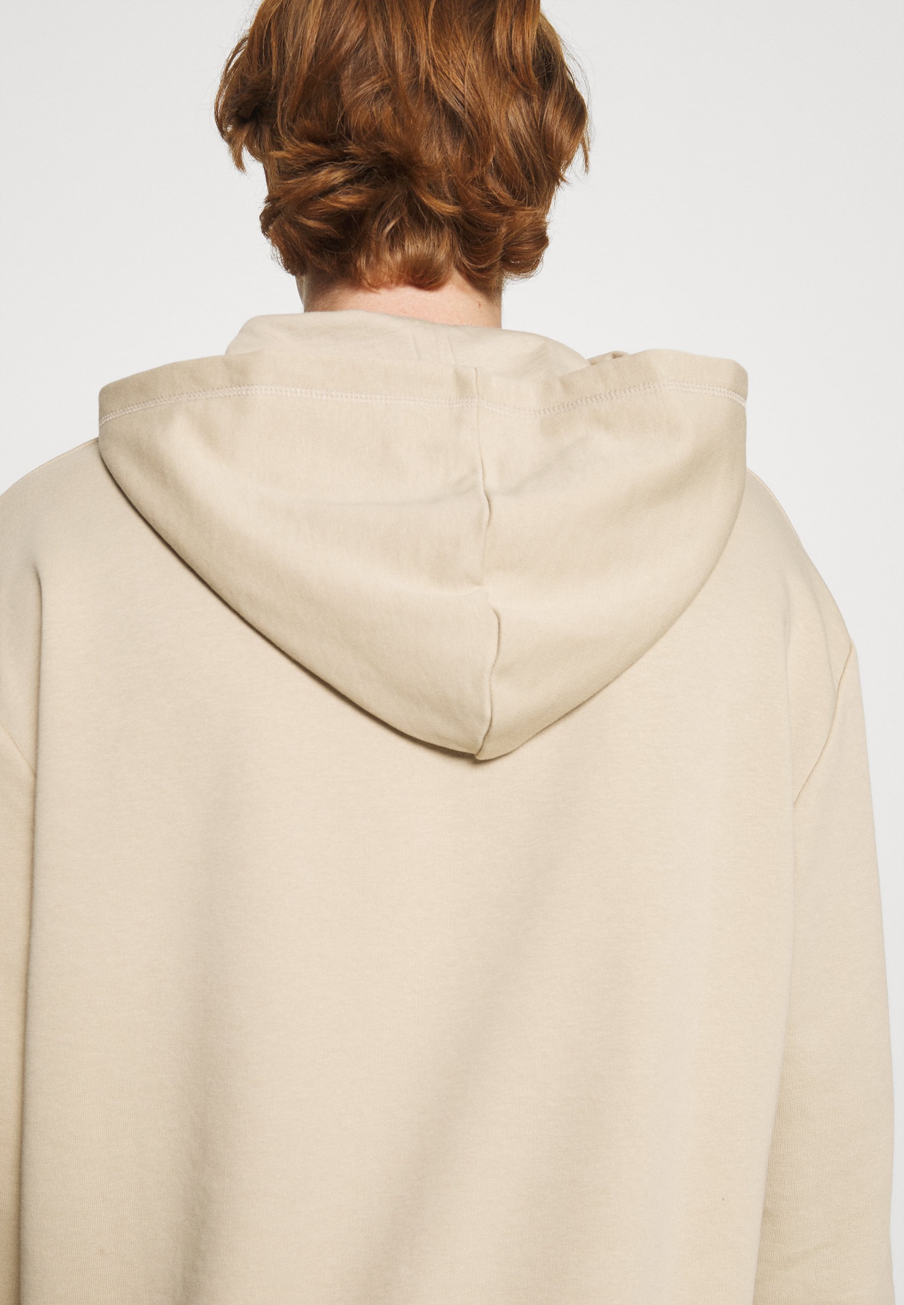 beige zip up