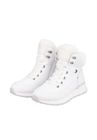 Bottines blanches avec col en fausse fourrure, devant lacé, accessoires en argent et zip sur le côté. Semelle robuste avec un design légèrement surélevé.