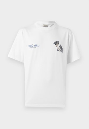 White crewneck t-shirt with blue text "Filling Pieces" and decorative broken plate graphic on upper chest.