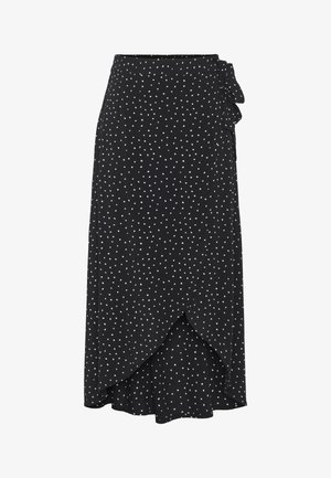 Juodasis apvyniojamas sijonas su baltais taškeliais, su šoniniu raišteliu ir asimetriniu kraštu, pagamintas iš lengvos medžiagos.