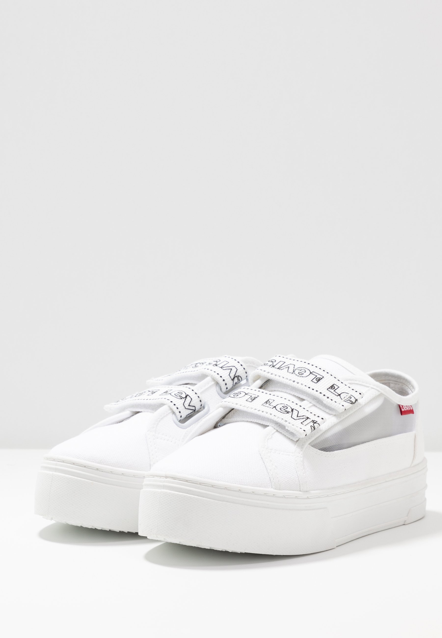levis white platform trainers