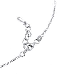 Silver chain bracelet featuring a lobster clasp, oval links, and a textured surface. Adjustable length with a simplistic design.