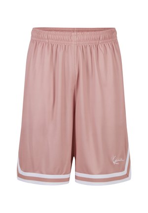 Růžové sportovní šortky s elastickým pasem, bílými dvojitými pruhy u lemu a malým bílým podpisovým logem na levé noze.