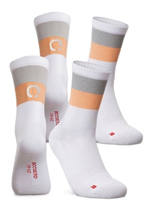 Four white crew socks with gray and orange bands near the top, red sizing text, and a small red letter on the toe area.