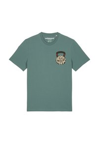 Mintgrünes Baumwoll-T-Shirt mit einem runden, grafischen Taschenprint eines Kettlebells und dem Text "No Pain No Gain" in Schwarz und Creme.