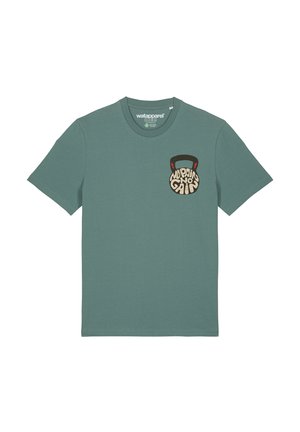 Mint green cotton t-shirt featuring a round, graphic pocket print of a kettlebell with the text "No Pain No Gain" in black and cream.