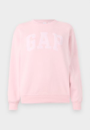 Lyserosa genser med rund hals og lange ermer, med ribbestrikkede cuffs, som har et preget GAP-logo på brystet.