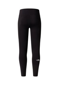 Leggings noirs en tissu extensible, avec une large taille et un petit logo blanc sur la jambe inférieure. Texture lisse et design ajusté.