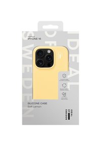 Yellow silicone phone case for iPhone 16 with textured surface. Packaged with a gray background featuring product details and icons.