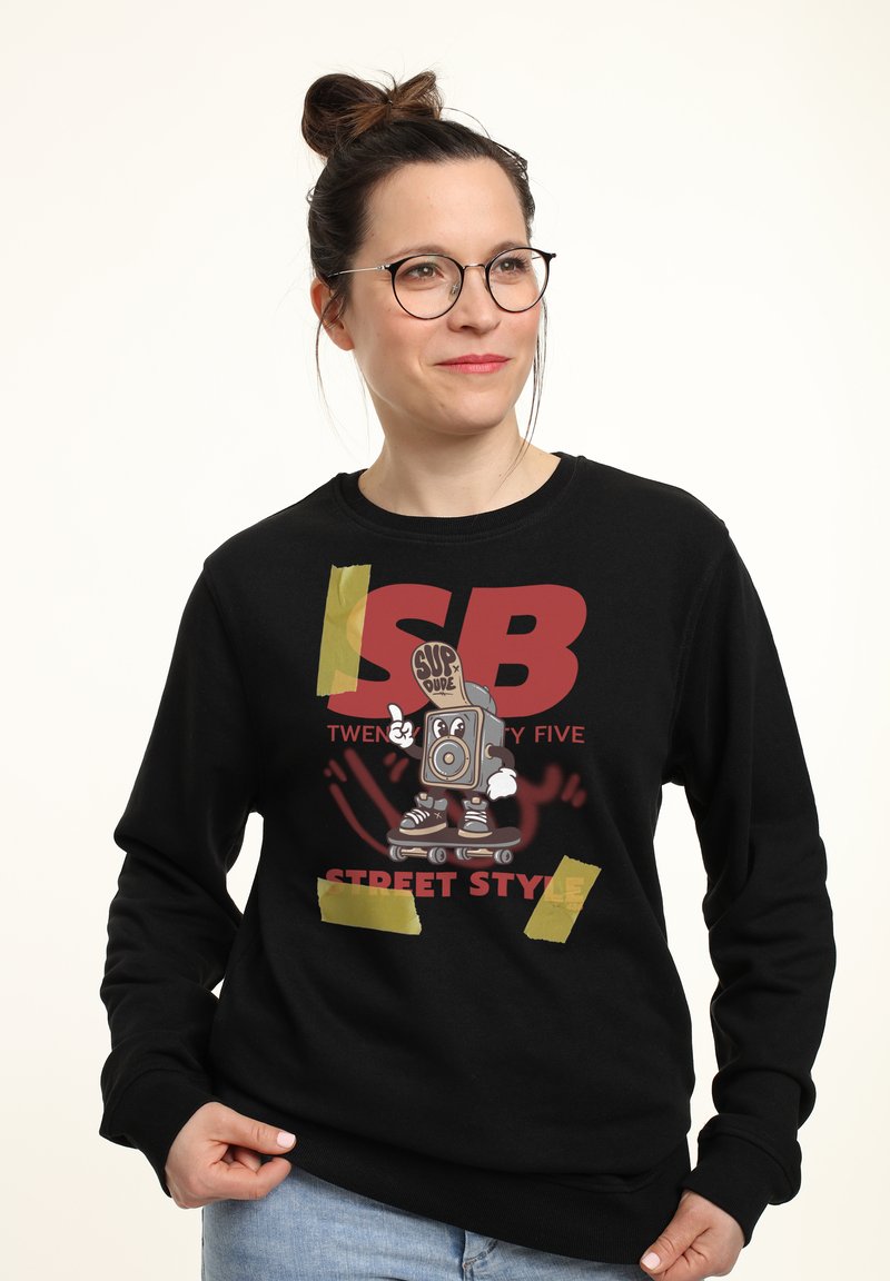 Felpa nera con un design grafico colorato che presenta un personaggio in skateboard e il testo "SB TWENTY FIVE STREET STYLE."