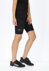 Swedemount GYM SHORTS TIGHTS W - Shorts - black