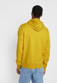 Tommy Hilfiger Felpa con cappuccio - yellow