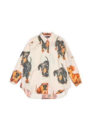 Camisa abotonada con un estampado colorido de perros salchicha sobre un fondo claro. Confeccionada en una tela suave, mangas largas y dobladillo curvado.