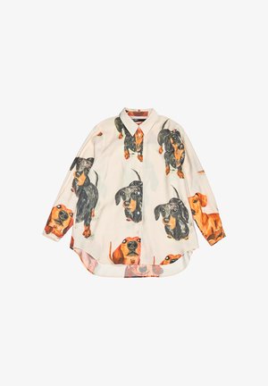 Camisa abotonada con un estampado colorido de perros salchicha sobre un fondo claro. Confeccionada en una tela suave, mangas largas y dobladillo curvado.