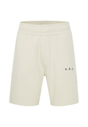Kremne kratke hlače z elastičnim pasom, opremljene s stranskimi žepi in z napisem "A.R.C." v črni barvi na spodnjem levem sprednjem delu.