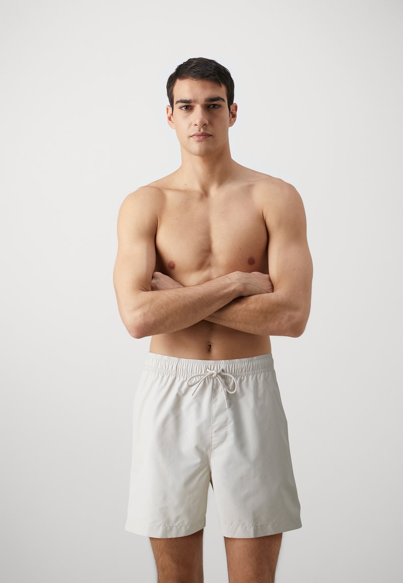 Calvin Klein Swimwear MEDIUM DRAWSTRING - Swimming shorts - stony beige