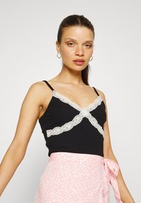 ONLY Petite ONLROSIE SLEEVELESS - Top - black