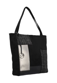 Sac tote noir en matériaux mélangés, avec un panneau en argent, une patch texturé noir et un accent de logo. Longs poignées pour le transport.