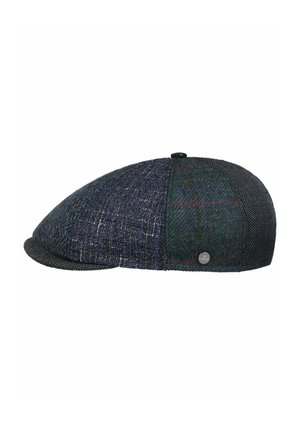 Flat cap with patchwork design in various dark blue and grey tweed patterns, featuring a small round metallic logo on the side.