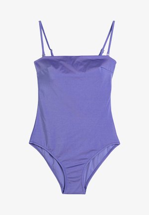 Paarse badpak met dunne verstelbare bandjes, gladde stof, aangesloten ontwerp en hoge beenopening. Geen zichtbare patronen of hardware.