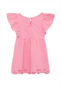 Pink dress made from textured fabric, featuring short ruffled sleeves, a keyhole back closure, and decorative cut-out details at the hem.