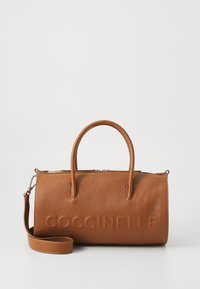 Brown leather handbag with a textured surface, rounded handles, and a detachable shoulder strap; features embossed brand name.