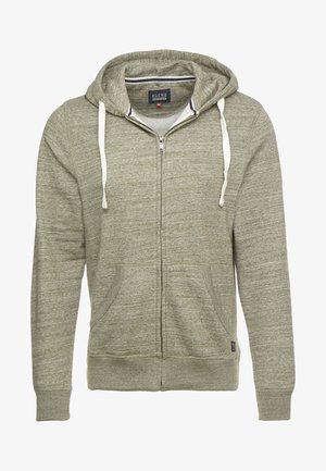 Haut de hoodie zippé gris clair en tissu texturé. Il présente une capuche avec cordon de serrage, deux poches avant et des poignets côtelés. Étiquette de marque visible à l'intérieur.