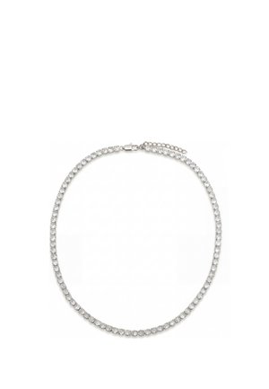 Silver tennis necklace with evenly spaced round clear gemstones and a clasp with an adjustable chain on a white background.