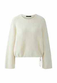 Crèmekleurige, fuzzy trui met een ronde hals, lange mouwen en een trekkoord aan de onderkant voor een verstelbare pasvorm. Zachte textuur en eenvoudig ontwerp.