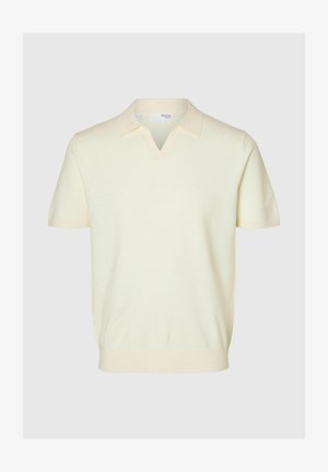 Short-sleeve, light yellow knit polo shirt with a V-neck and ribbed collar. Features a soft texture and a straight-cut hem.