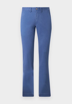 Modre hlače iz bombažne mešanice s pravim krojem, zapiranjem na gumb, funkcionalnimi žepi in gladko teksturo. Preprost in vsestranski slog.